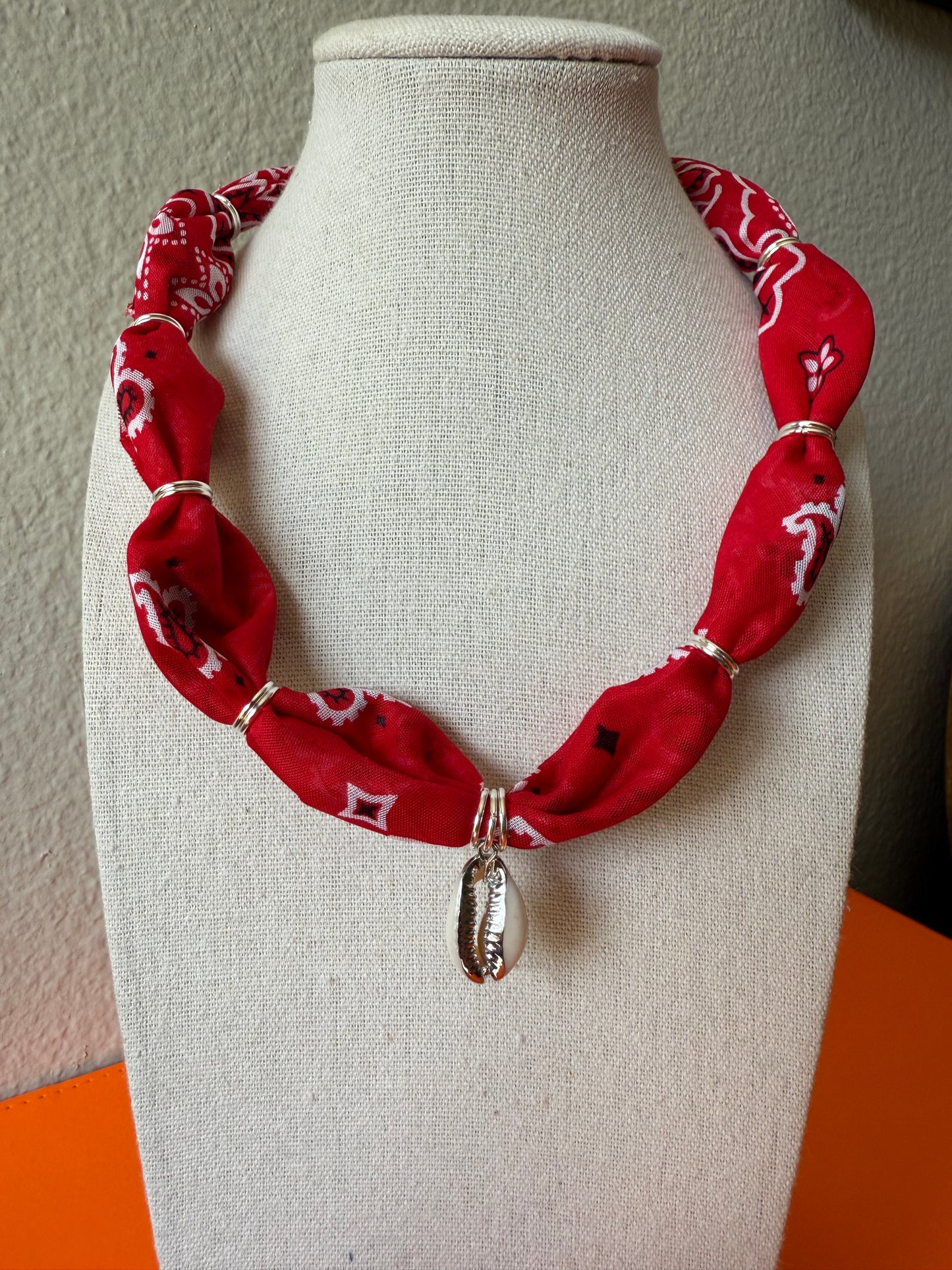 Red w/ Silver Cowrie Shell