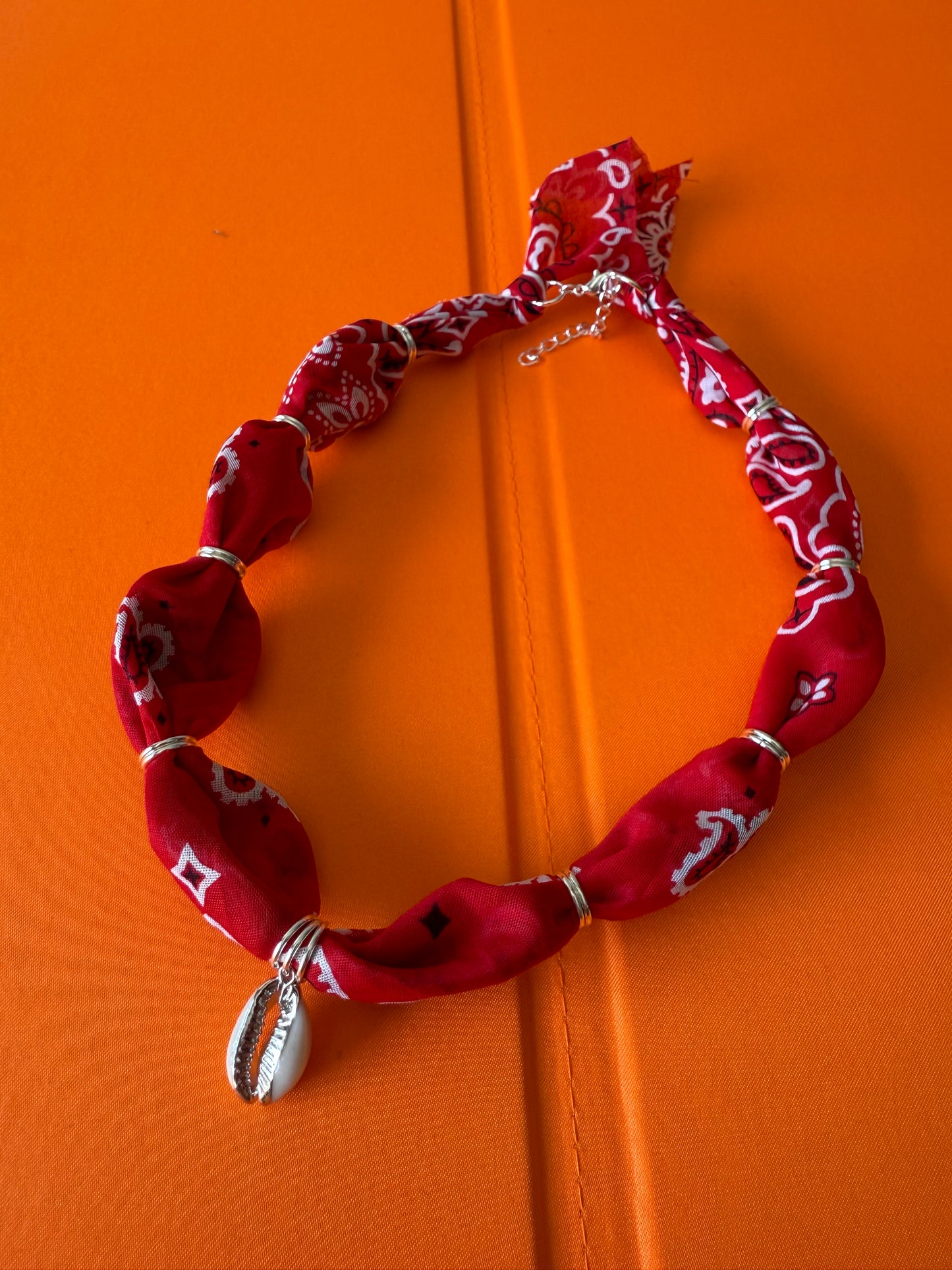 Red w/ Silver Cowrie Shell